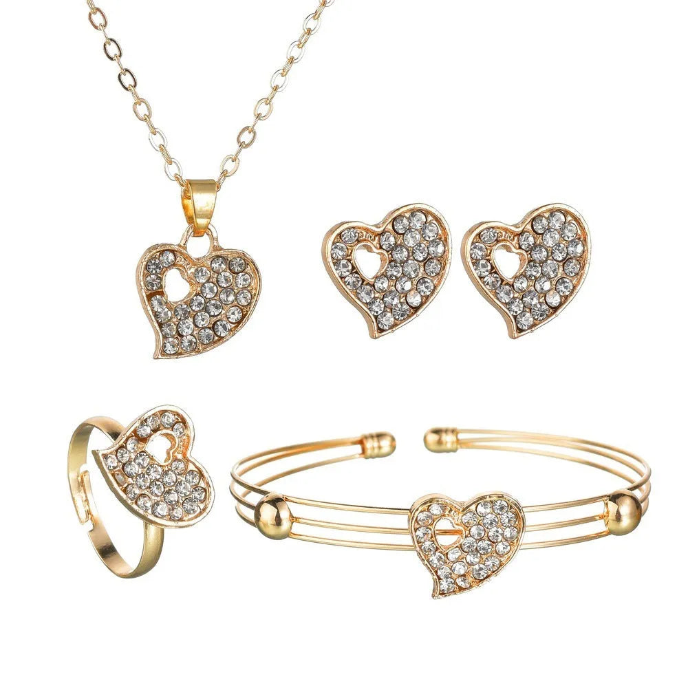 Gold alloy jewellery set with love heart, water drop, and bell pendants including earrings, necklace, and bracelet