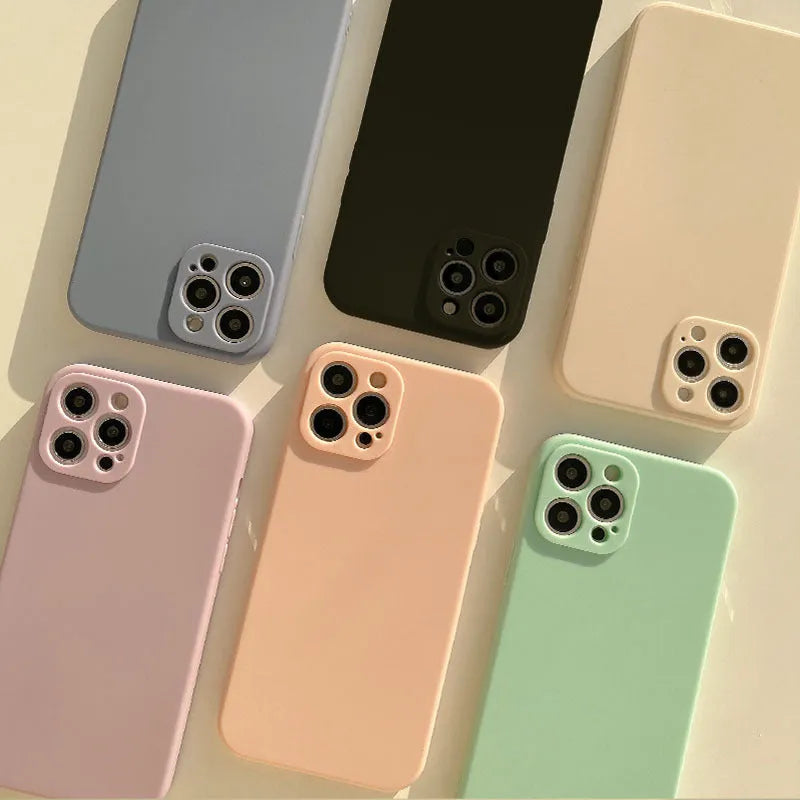 Frosted silicone phone case for iPhone 14 in slate blue colour showing matte texture and precise cutouts.
