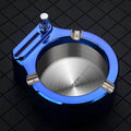 Large stainless steel ashtray with permanent match lighter and three cigarette slots in blue colour