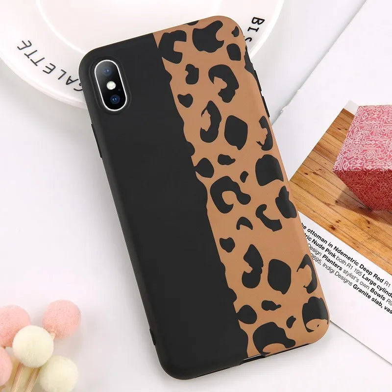 Leopard print pattern hard case for iPhone in black, blue, or pink.