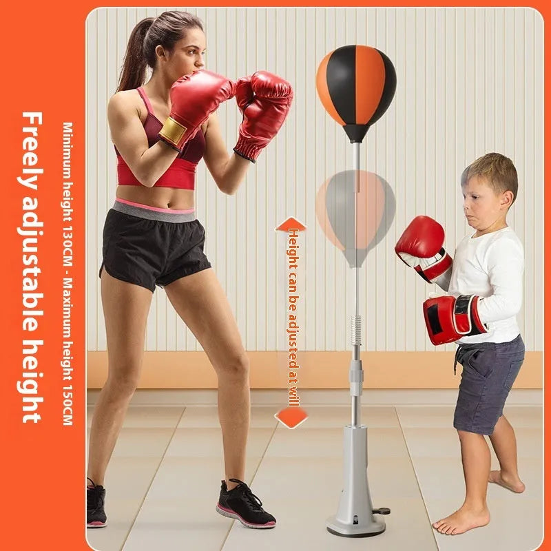 Vertical inflatable speed ball punching target with PU ball, boxing gloves and bandages on a wood floor for home training