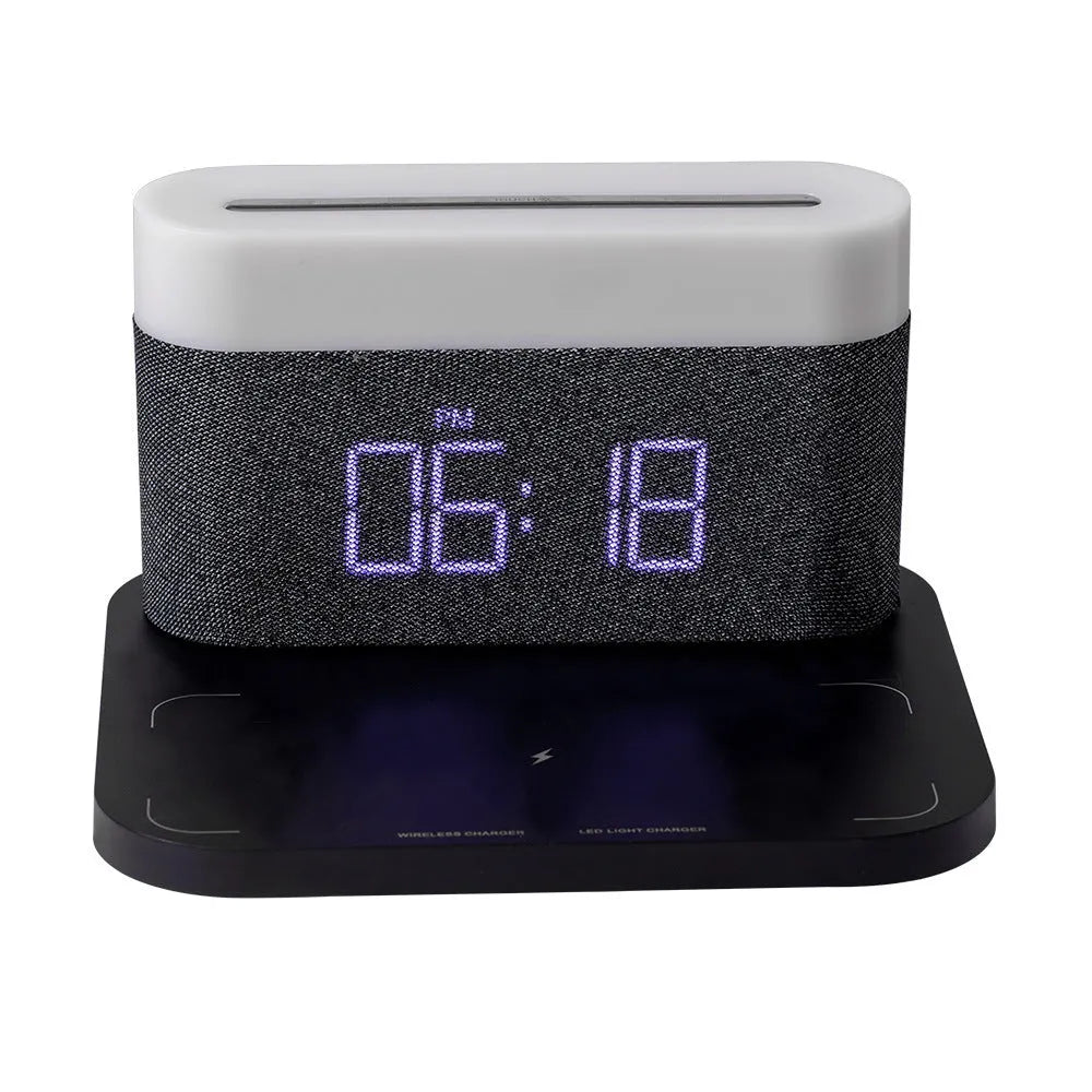 White or black four-in-one bedside lamp with wireless phone charging pad, digital clock display, and LED lighting