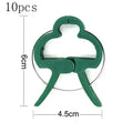 Green plastic and zinc plant fixing clips in large and small sizes for supporting climbing plants in the garden.