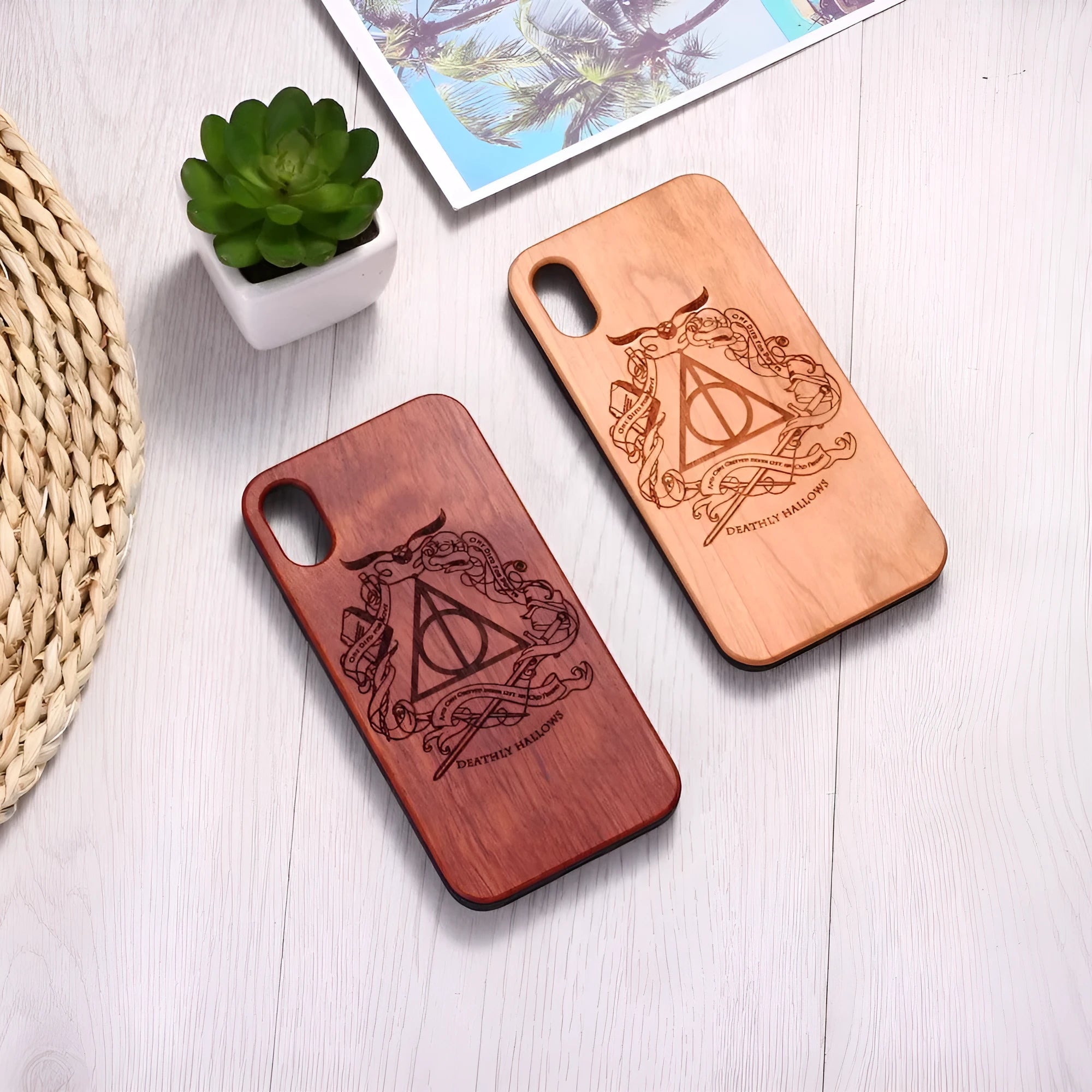 Wooden mobile phone case with laser-carved wood back and black TPU bumper frame for iPhone.