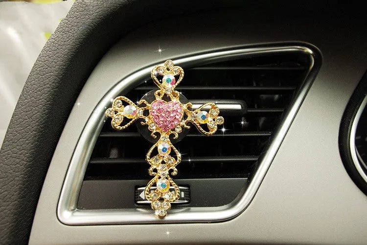 Alloy car perfume clip with liquid fruity scent attached to air vent in various cartoon styles