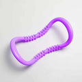 Circular purple yoga ring for stretching and Pilates exercises