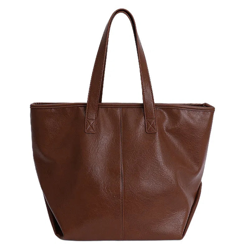 Large-capacity PU tote bag with double straps, 3D outer pocket, zip hidden pocket and phone pocket in black