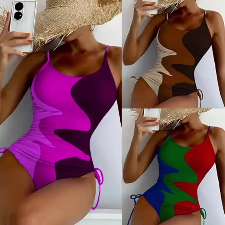 Women's blue sleeveless one-piece swimsuit with fixed swimming trunks on a white background.