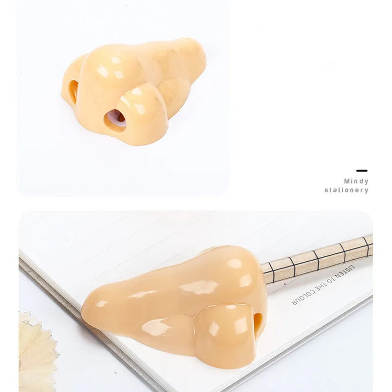 Plastic geometry-shaped manual pencil sharpener in flesh colour measuring 58x45x30mm