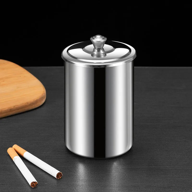 Stainless steel fly ash ashtray with cover measuring 7.5cm by 9.5cm