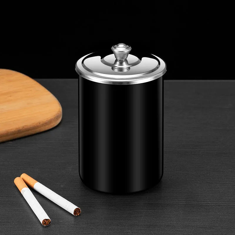 Stainless steel fly ash ashtray with cover measuring 7.5cm by 9.5cm