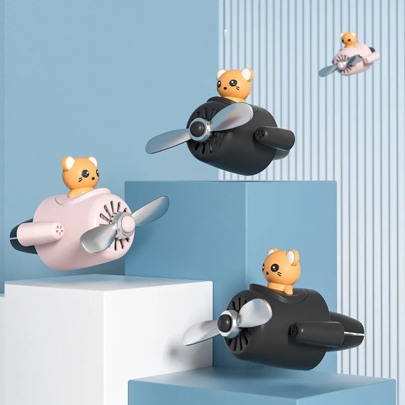 Cartoon airplane shaped car air freshener with vent clip mounting and fragrant slices