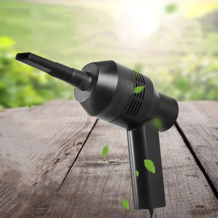 Black cordless USB desktop mini vacuum cleaner for keyboard and computer dust clean-up.