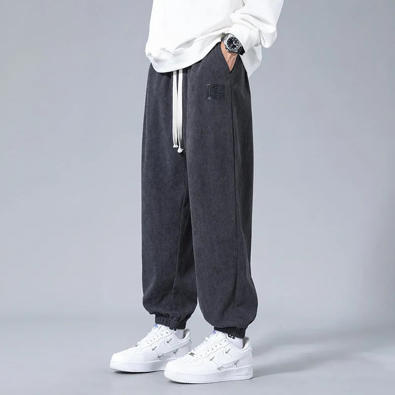 Men's workwear casual sports trousers in polyester fibre with letter print, available in black, dark gray, and khaki