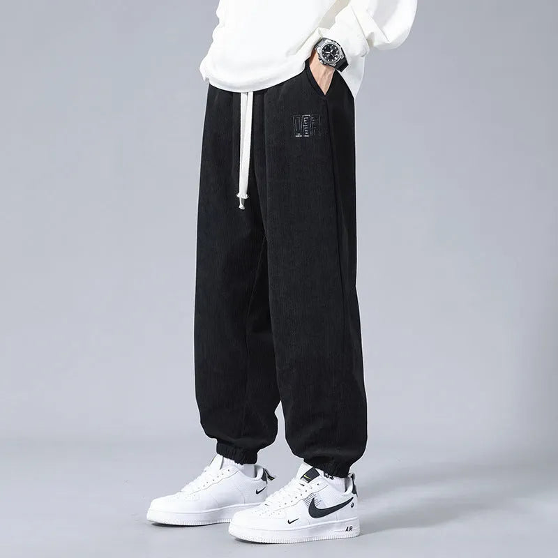 Men's workwear casual sports trousers in polyester fibre with letter print, available in black, dark gray, and khaki