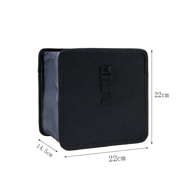 Black folding car trash can made from waterproof Oxford cloth with hanging strap and 22x14.5x22cm dimensions