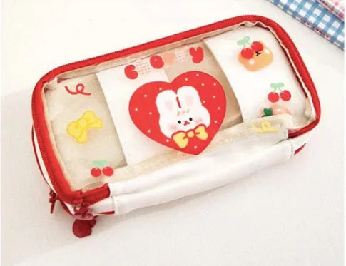 Transparent TPU pen bag with cartoon rabbit design in pink or red colour options.