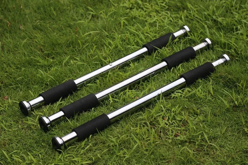 Steel adjustable indoor pull-up bar extended to fit within a door frame.
