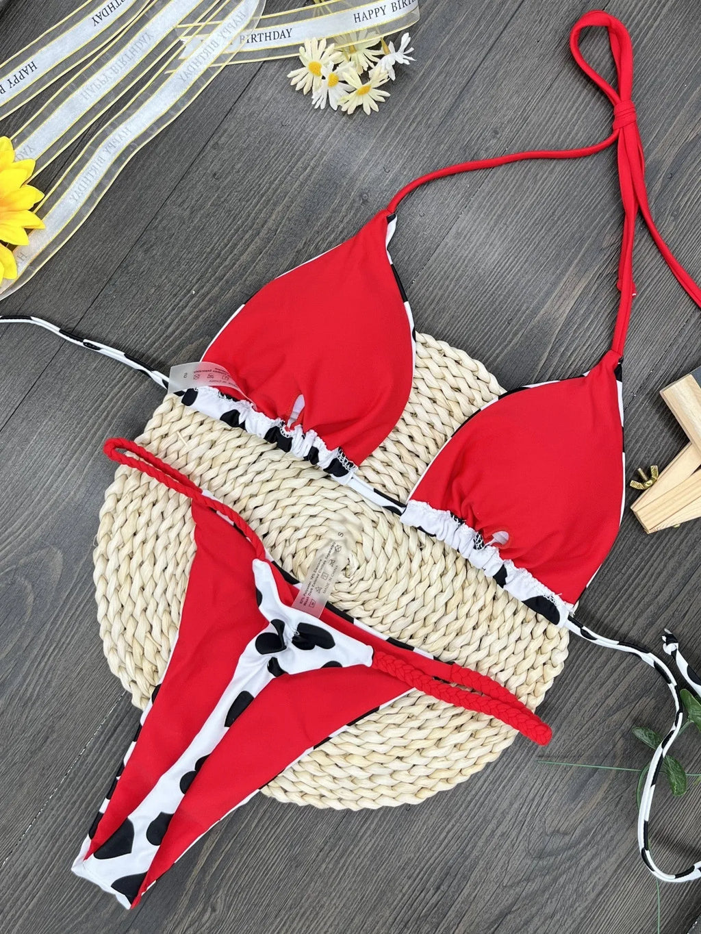 Women's red heart print backless one-piece swimsuit with a side split.