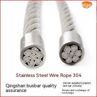 Black coated 304 stainless steel anti-theft security wire rope on a reel showing its multi-strand construction.