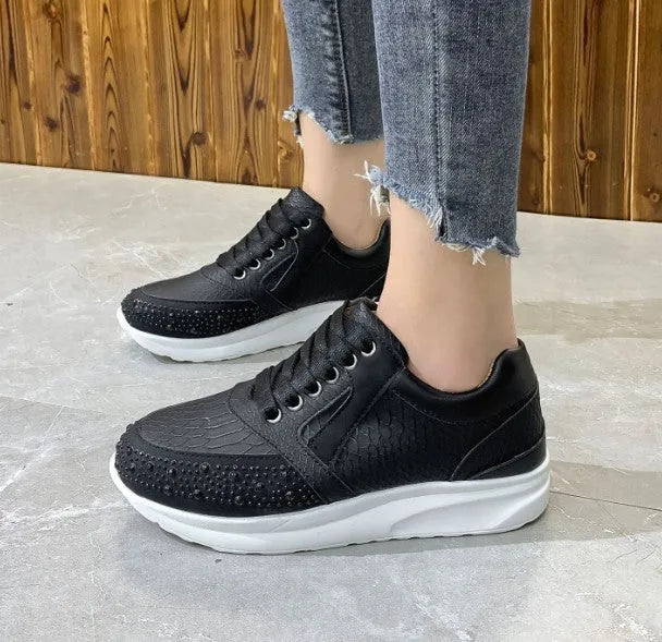 Plus size women's black sports running shoes with rhinestone accents, non-slip rubber sole, and front lace-up closure