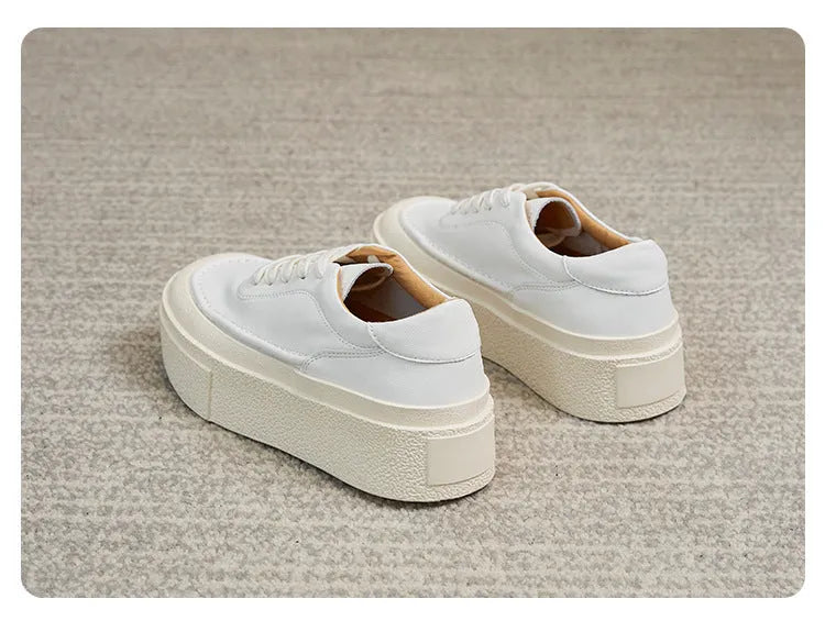 Women's black platform casual sports board shoes with tied design and round toe