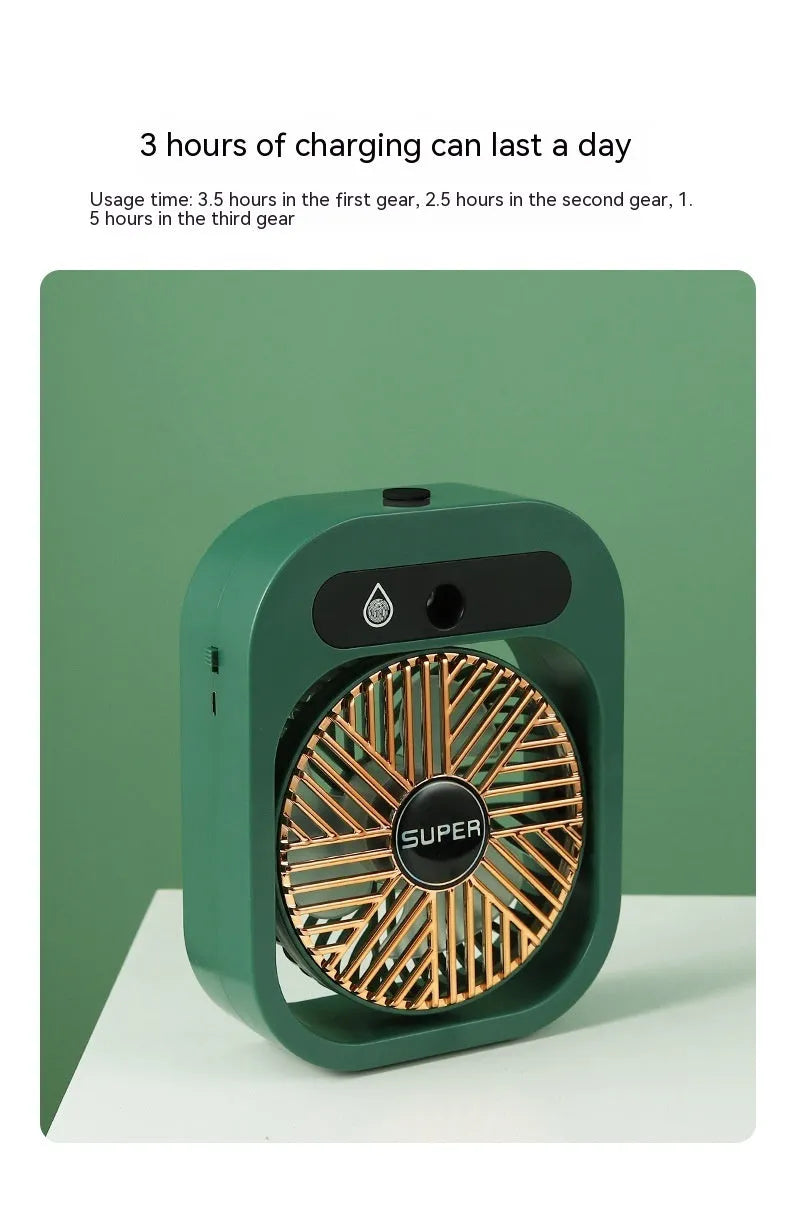 Green and white portable USB misting fan with water tank and adjustable air vent on a desk.