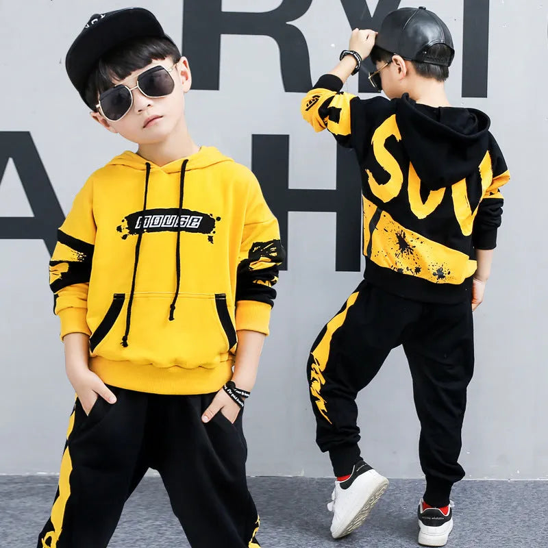 Boys yellow cotton hooded sports suit two-piece set with long sleeves and trousers.