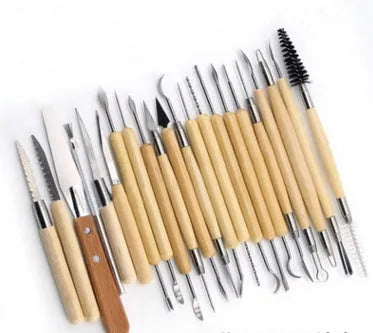 27-piece pottery clay tool set with stainless steel tools, wood handles, and roll organiser