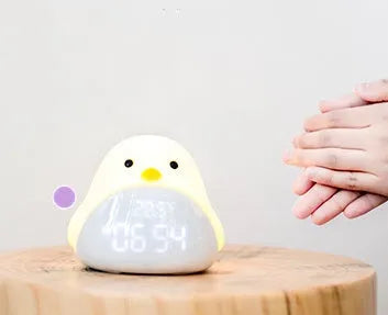 Time Bird multi-functional electronic smart clock in yellow with cartoon bird design, LED display showing time and temperature, USB model