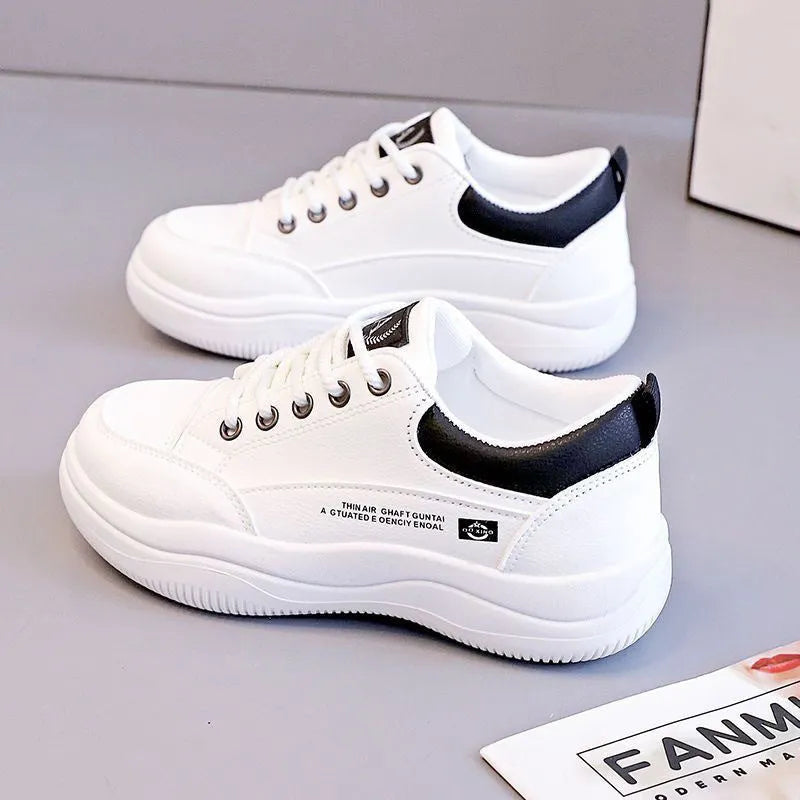 Women's white Korean-style leather pumps with cross straps and a 3-5cm mid heel on a rubber sole.