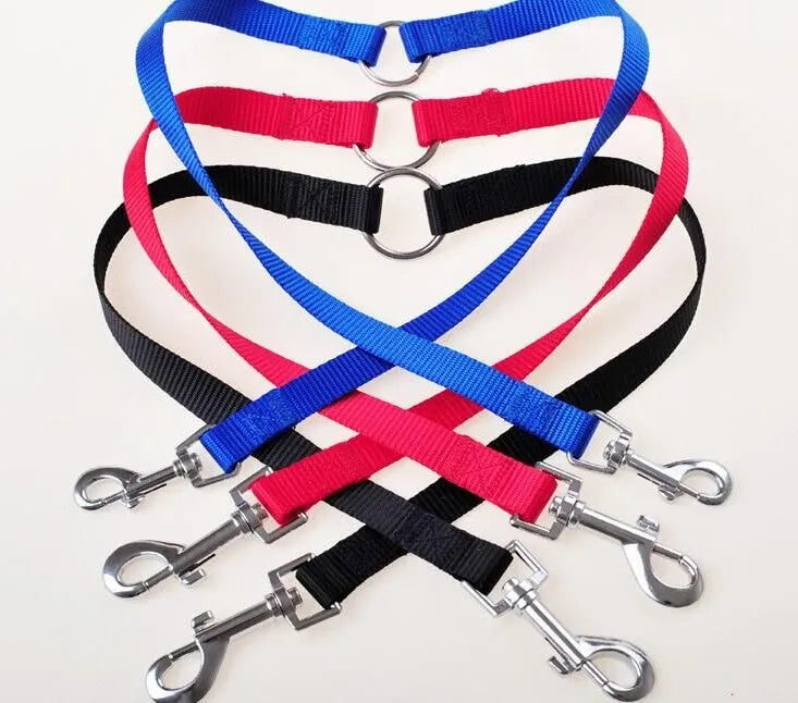 Double dog lead coupler in nylon, available in black, blue, purple, and red, sizes small medium large, 45cm length
