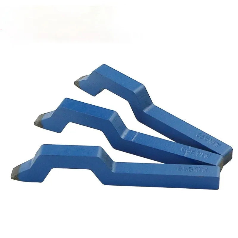 Curved alphanumeric steel stamping tool for jewellery on a metal surface.