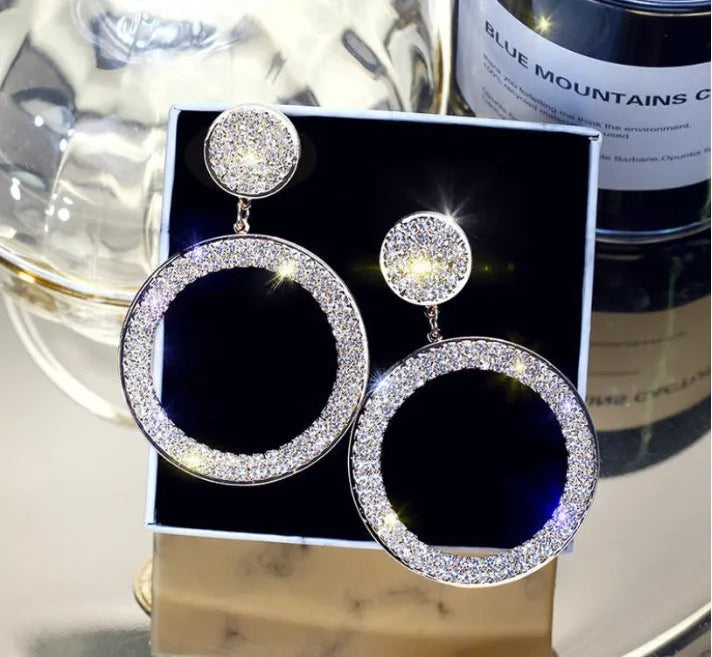 Geometric exaggerated circle ear hook earrings in gold and silver colours for women