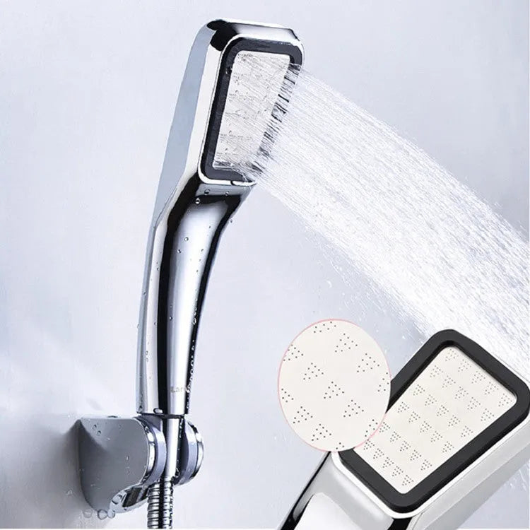 Orange hand-held pressurised shower head with wall bracket and installation hardware sets