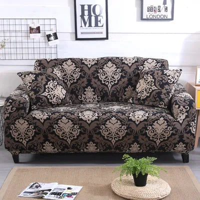 Geometric patterned stretch sofa slipcover on a modern three-seater sofa.