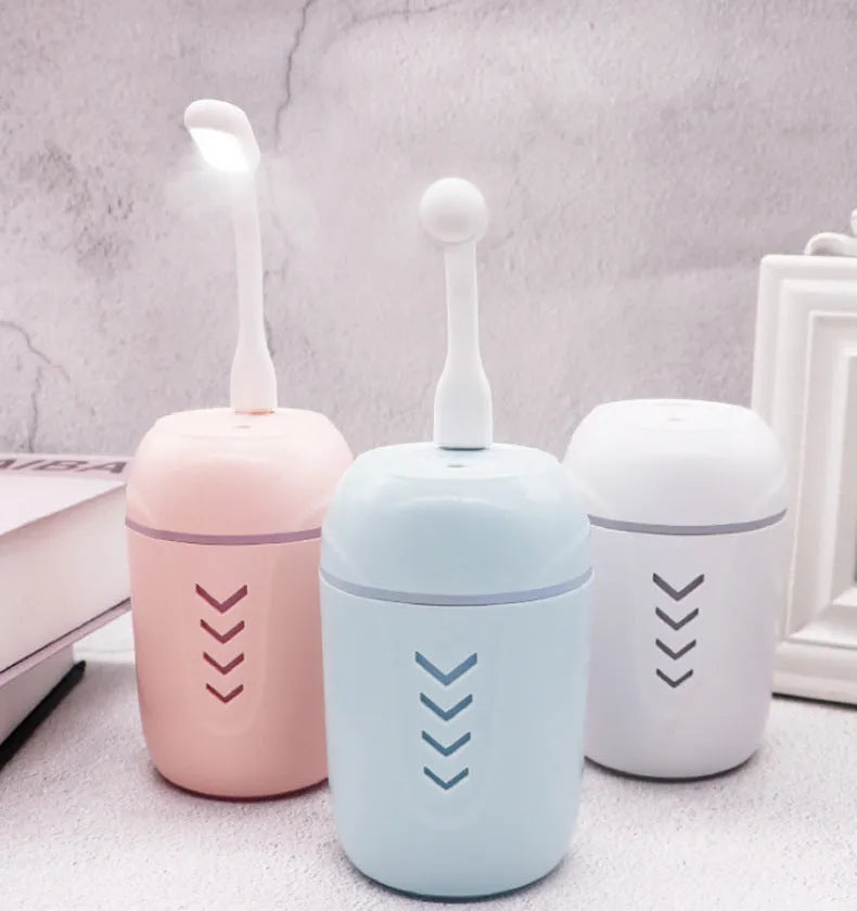X3 portable car humidifier in blue colour with columnar shape and 200ml tank capacity