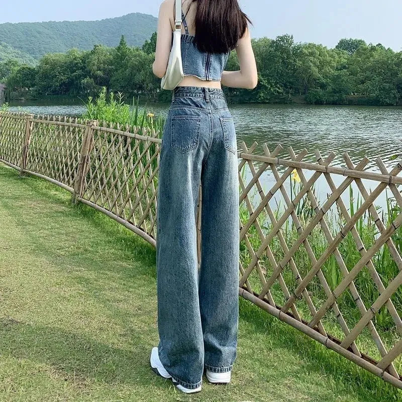 Slim straight-leg floor-length high-waist wide-leg pants in retro blue on a woman