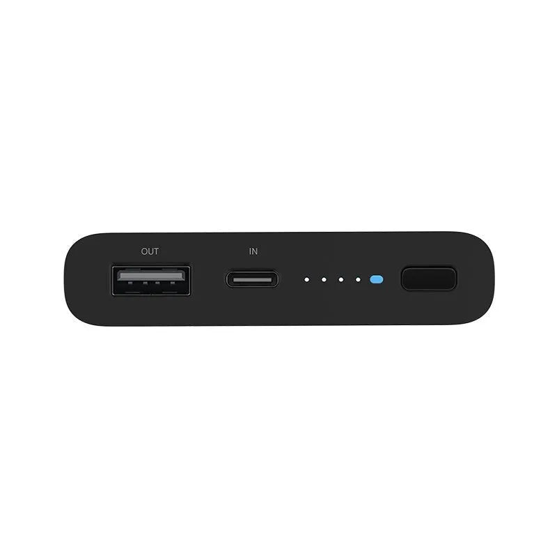 White and Black coloured 10000mAh portable power bank with wireless charging pad and USB ports.