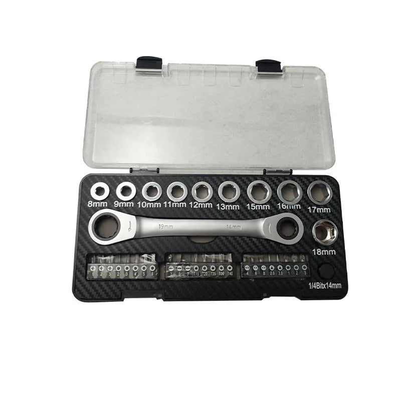 Ratchet wrench set with two-way mechanism, sockets, and batch heads arranged on work surface