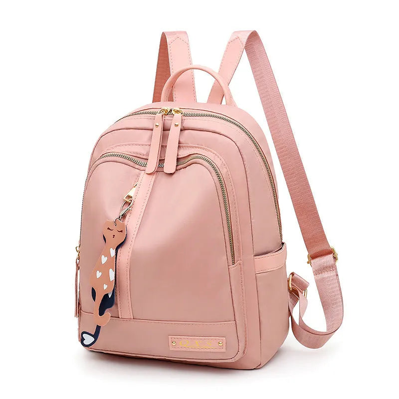 Women's black nylon casual backpack with double shoulder straps and front pocket