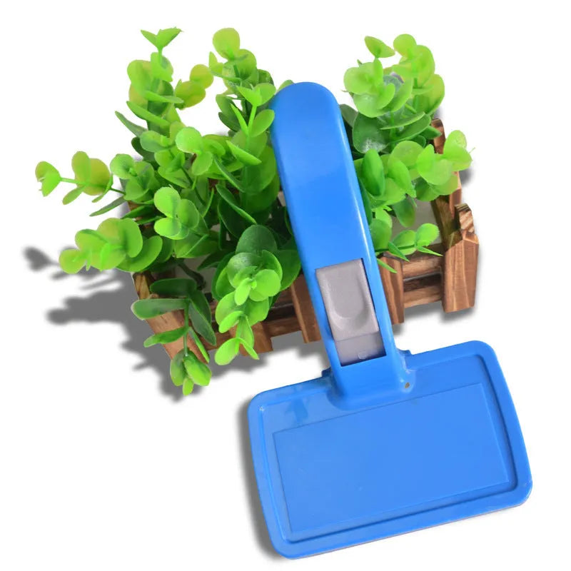 Self-cleaning pet brush comb with durable plastic body, comfortable handle, and 16 x 10 cm size for dogs and cats