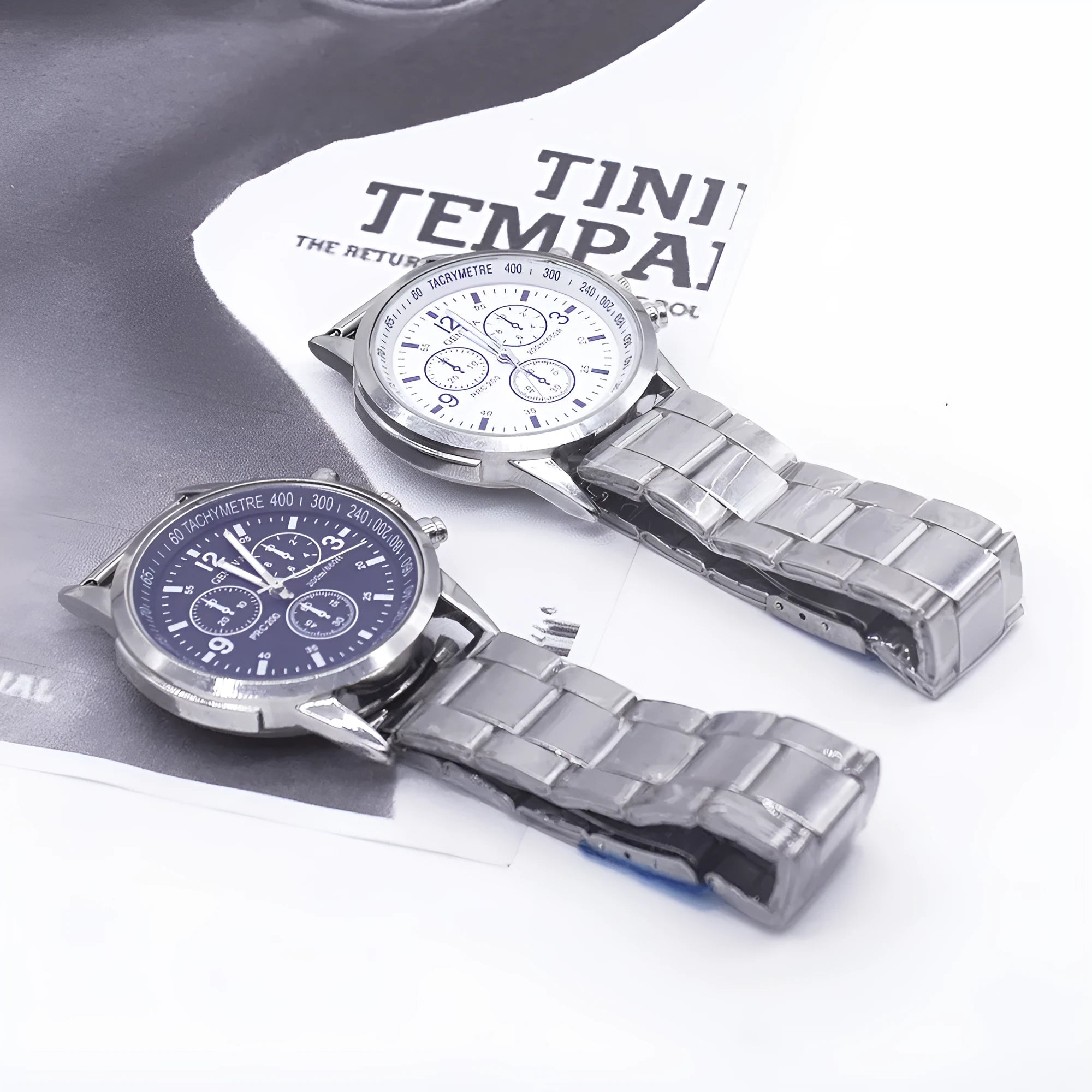 Men's quartz wrist watch set with round alloy dial, black face, and stainless steel buckle on a plain background