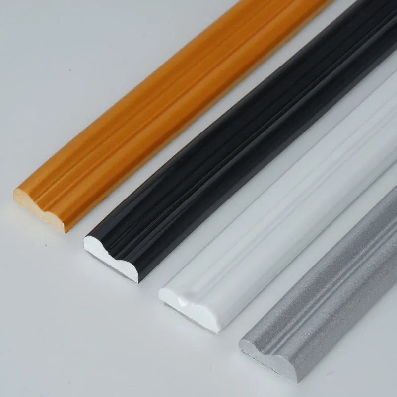 Flexible PVC self-adhesive background shaping frame in black, on a white surface.