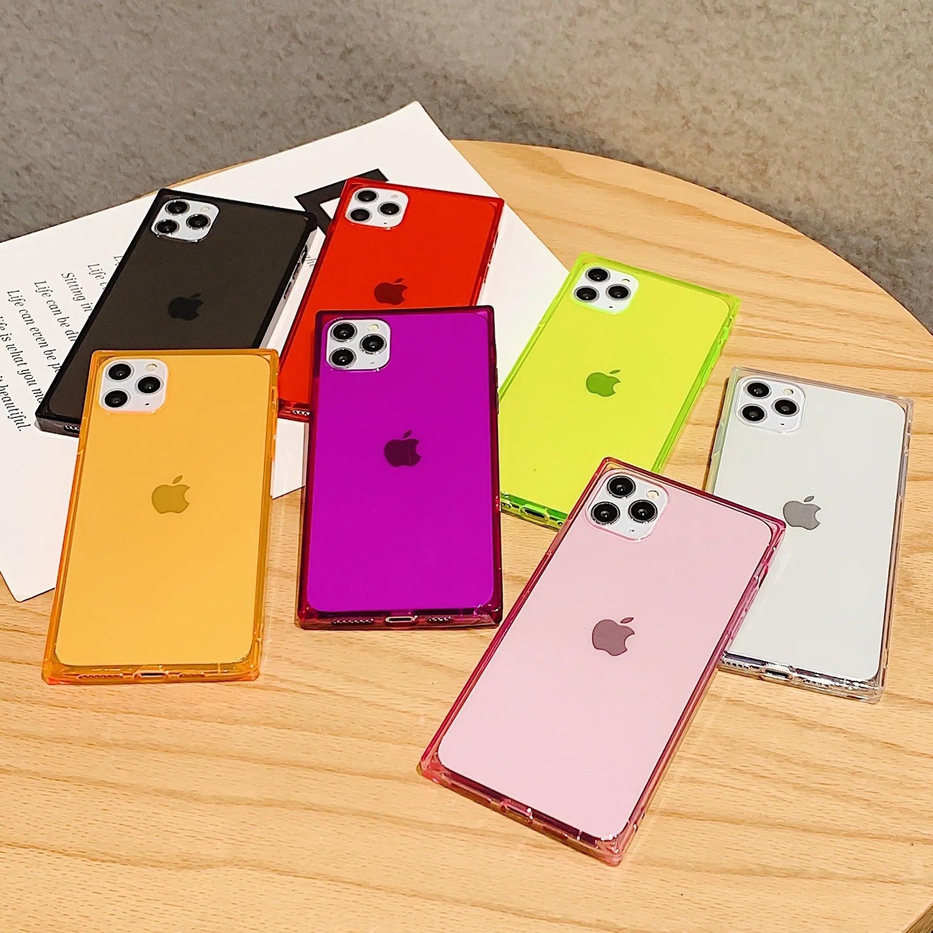 Square transparent TPU phone case for iPhone 12, showing slim profile and cutouts