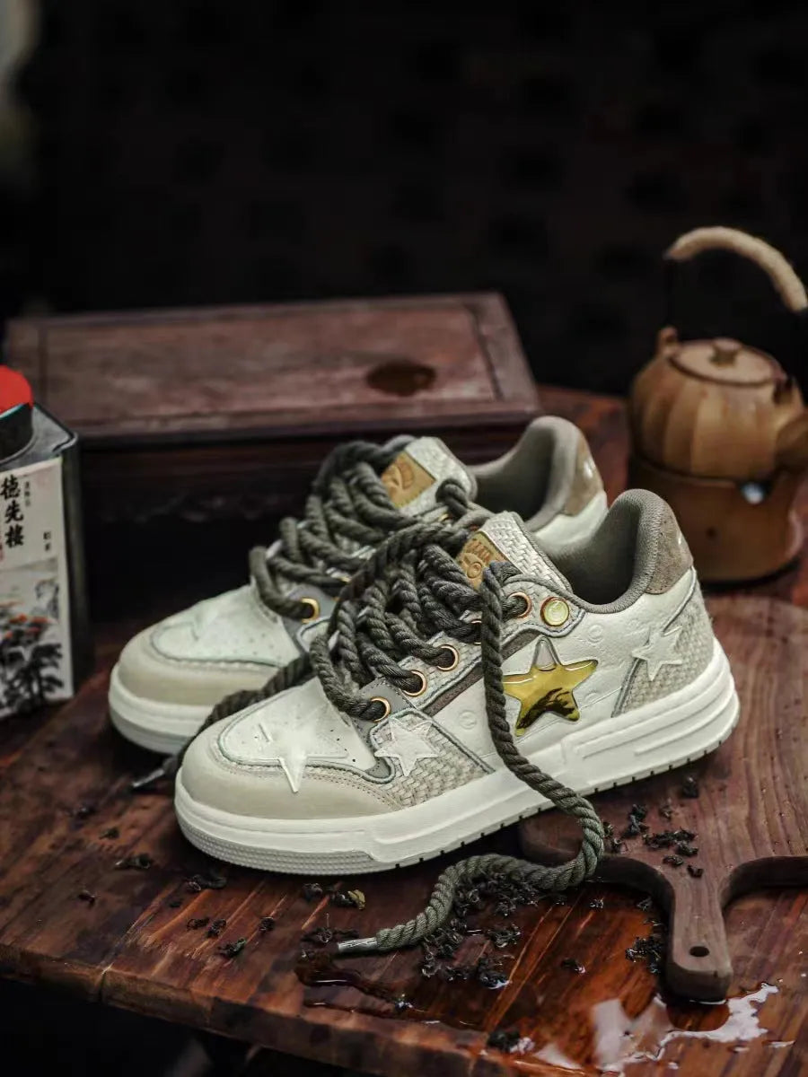 Cowhide leather low-top platform running shoes in 'West Lake Dragon Well Tea' colour with round toe and lace-up front.