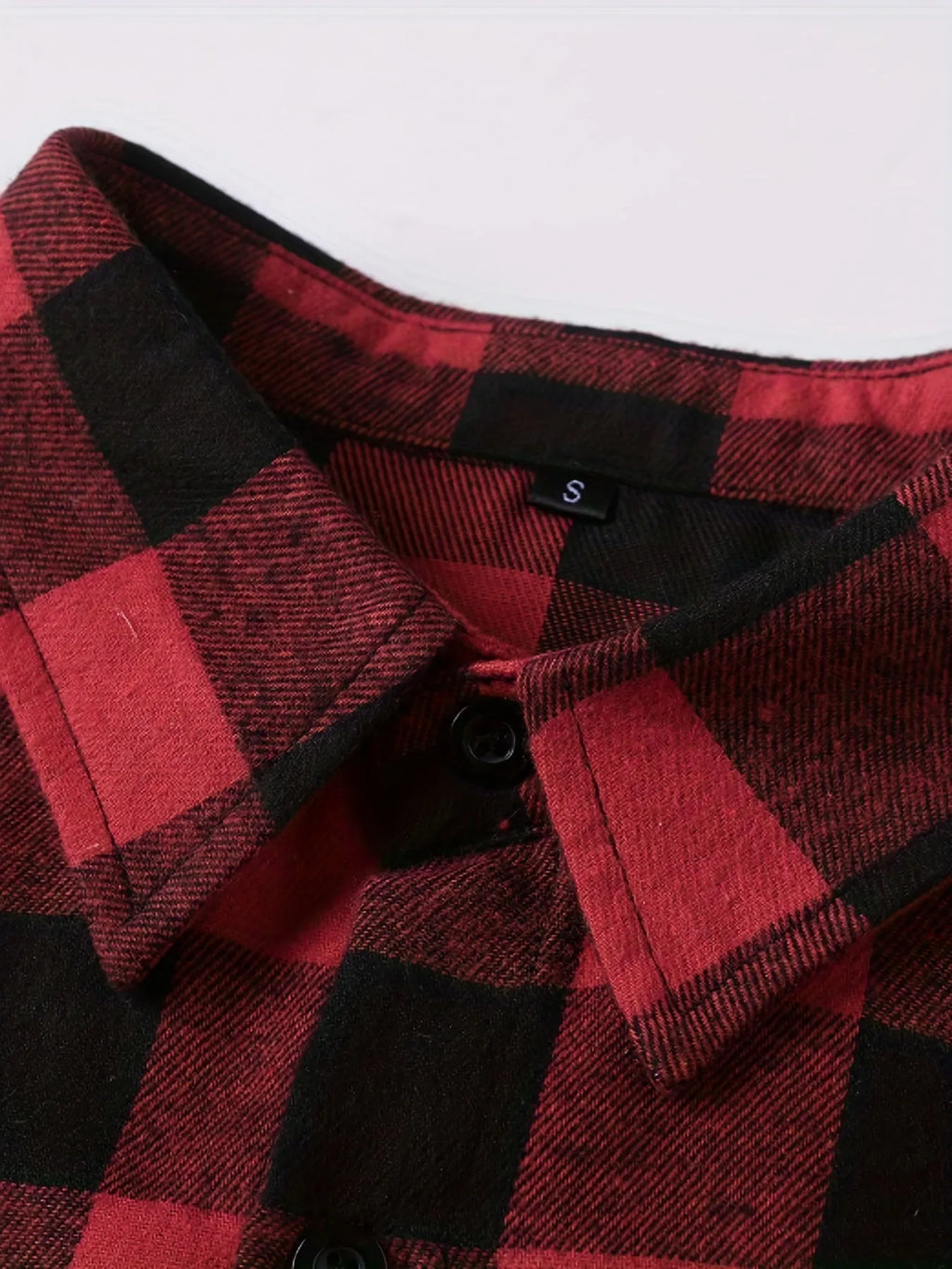 Teenage men's red and black checked long-sleeved casual shirt with button-front closure