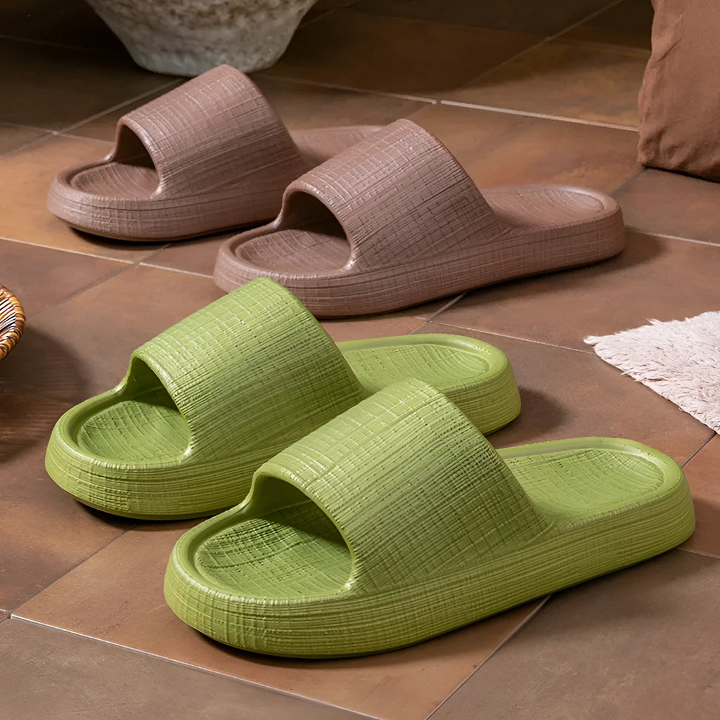 Unisex adult EVA flip flop slippers with toe ring and non-slip sole in multiple colours.