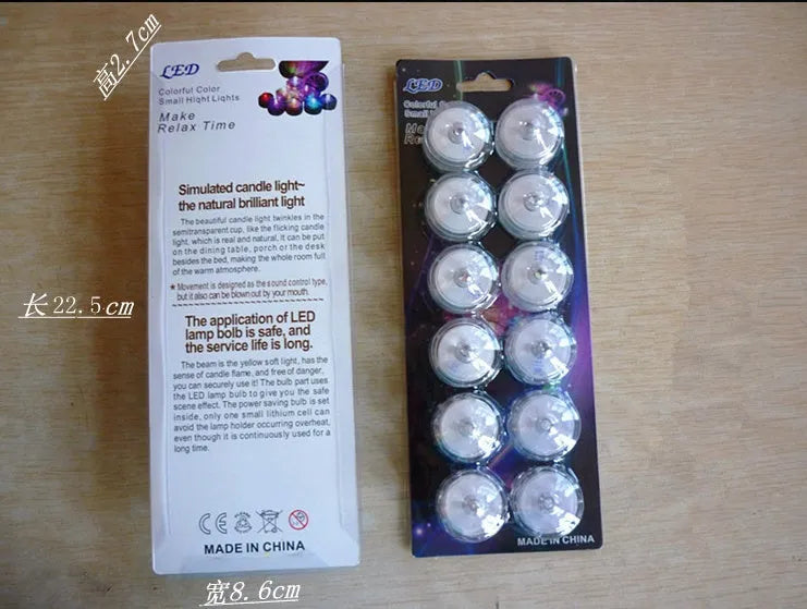 Set of 12 miniature LED waterproof candle lights in 7 colours with round and plum shapes