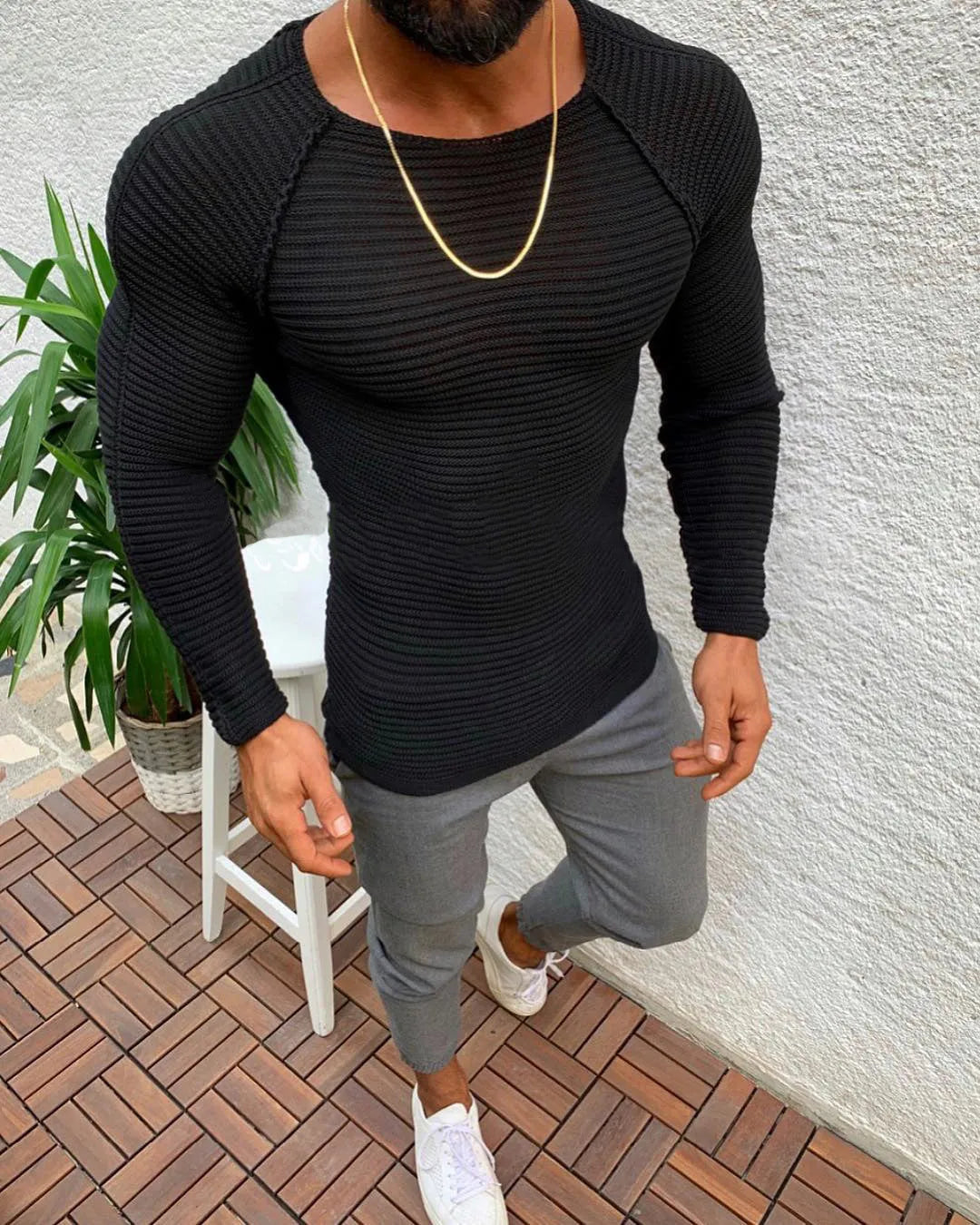 Men's slim-fit acrylic knit pullover sweater in black, round neck, long sleeves, ribbed hem